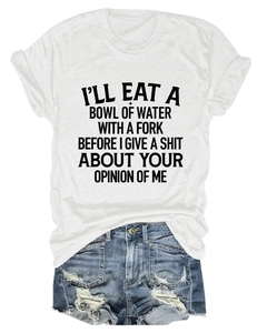 Detail of white cotton T-shirt featuring bold black typography and distressed denim shorts