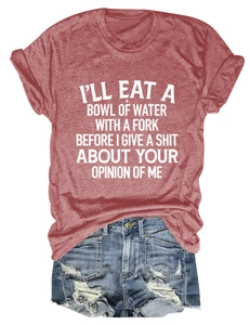 Flat lay of rust red heather cotton t-shirt with slogan and ripped denim shorts