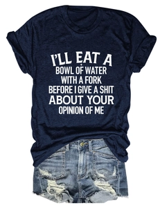 Flat lay of navy crew neck t-shirt and distressed denim shorts with frayed hems