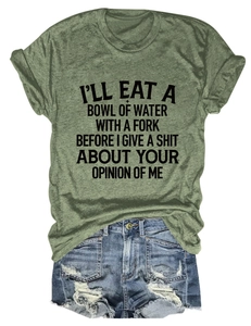 Army green crew neck T-shirt with black slogan paired with distressed denim shorts