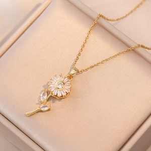 Rotating sunflower necklace in gold finish with sparkling zircon petals and stem detail