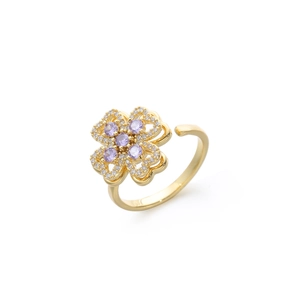 Gold adjustable four-leaf clover ring with purple stones and white zircon accents
