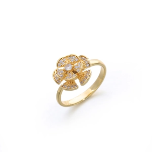 Elegant gold flower ring with crystal pavé petals on a minimalist thin band