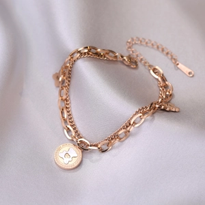 Rose gold layered bear bracelet with oval link and snake chains for women accessory