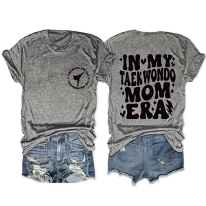 Detail view of Taekwondo Mom Era graphic print on a casual grey crewneck T-shirt back