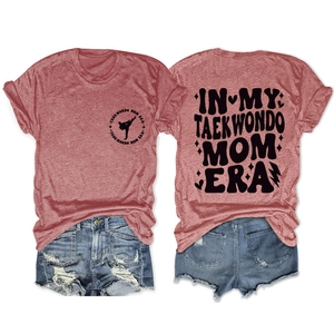 Front and back view of Taekwondo Mom Era t-shirt with blue ripped denim shorts