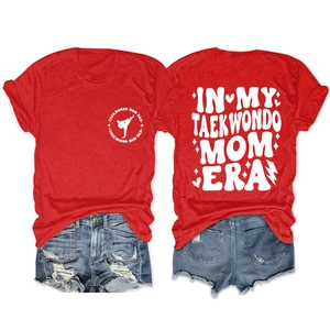 Detail of red Taekwondo Mom Era T-shirt back print with distressed denim shorts