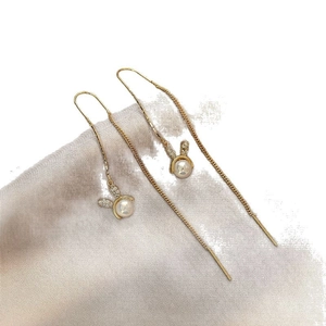 Elegant gold rabbit drop earrings with white pearls and sparkling cubic zirconia details