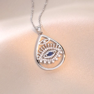 Titanium steel Evil Eye pendant necklace with blue stone and white crystals
