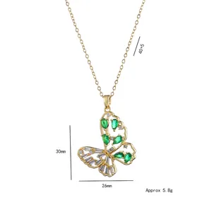 Élégant collier papillon doré avec zircons verts et chaîne à maillons réglable