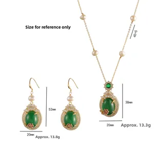 Vintage gold necklace and earring set with green stones, white pearls and emerald zircons