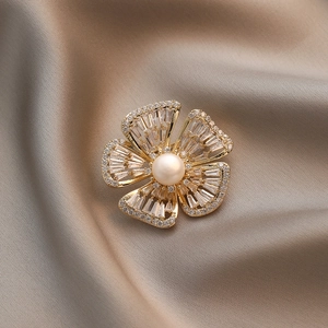 Elegant gold sun flower brooch with white freshwater pearl and zircon micro-pave crystals