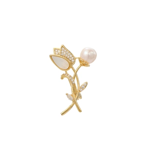 Detail of tulip brooch with white shell petals, pink pearl and paved crystal accents