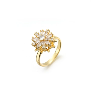 18K gold plated spinning snowflake ring with micro-set zircon crystals on white background