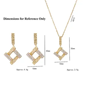 Golden geometric jewelry set with hammered texture and cubic zirconia pendant and earrings