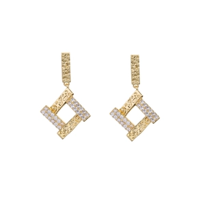Geometric gold plated earrings with layered diamond accents and hammered texture