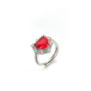 Macro view of adjustable silver ring featuring a red heart gemstone and diamond halo