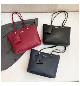 Three large casual tote bags in burgundy, black and navy blue with matching coin purses