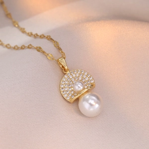 Elegant 18K gold-plated double pearl necklace with micro-set zircon floral pendant