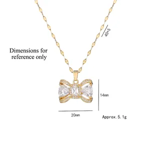 Elegant bow tie necklace in gold plated titanium steel with clear zircon stones for women