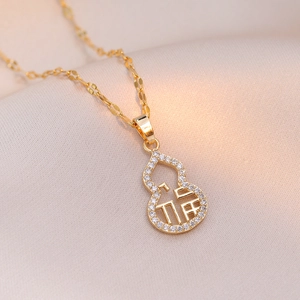 Golden titanium gourd pendant necklace with zircon border and Fu character engraving