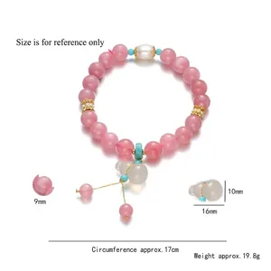 Natural rose quartz bracelet with white gourd jade pendant and golden tassels