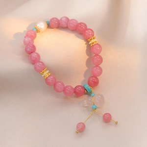 Pink crystal bead bracelet with pearl, turquoise accents and a rose gourd pendant