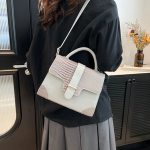 Minimalist grey faux leather shoulder bag with crocodile texture and gold hardware detail