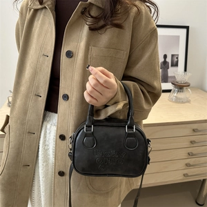 Retro black Boston handbag with Lucky OHIO embossing and adjustable shoulder strap