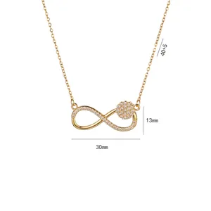 Gold infinity necklace with sparkling zircon clusters on a delicate cross chain