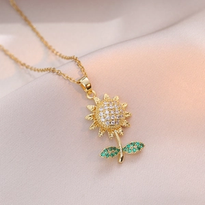 Titanium steel sunflower necklace with sparkling zircon and green leaf pendant on silk