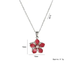 Red flower spinning necklace with zircon center and silver tone chain for women