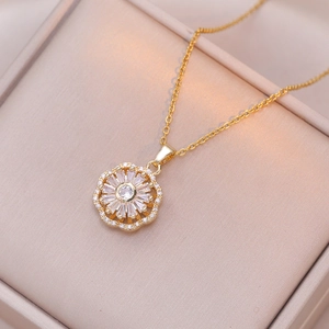 Golden flower pendant necklace with zircon crystals in a premium velvet jewelry gift box
