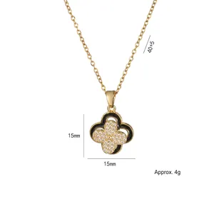 Collier trèfle doré avec émail noir et zircons, pendentif 15mm, chaîne de 40+5cm