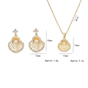 S925 Silber Muschel Schmuckset mit Süßwasserperlen und Zirkonbesatz in eleganter Goldoptik