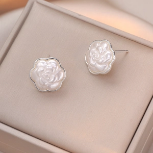 French vintage matte white camellia flower stud earrings with elegant mother of pearl luster