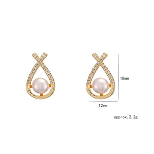 Elegant gold-plated cross frame earrings with cubic zirconia and fresh water pearls