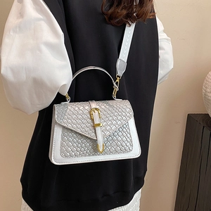 Silver woven crossbody bag for women with gold clasp and jacquard wide strap