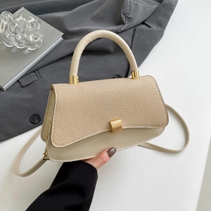 Chic beige crossbody handbag with woven texture and gold clasp for women fashion