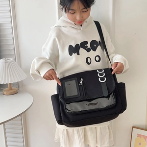 Sac à bandoulière noir en toile avec fenêtre transparente et sangle réglable