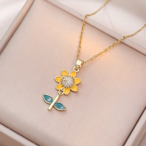 Elegant gold sunflower necklace with yellow enamel petals and zircon pendant in gift box
