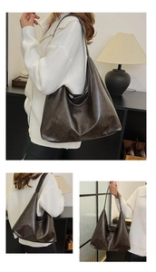Detailed views of a dark brown soft leather hobo bag in various carrying positions