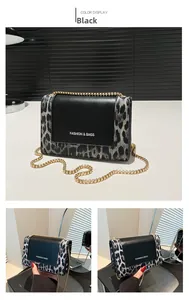 Detail of leopard print stitching on small crossbody bag with gold chain strap