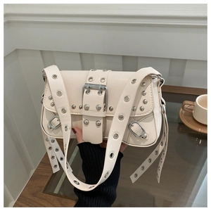 Detail of off-white punk shoulder bag with silver eyelets and buckle strap design