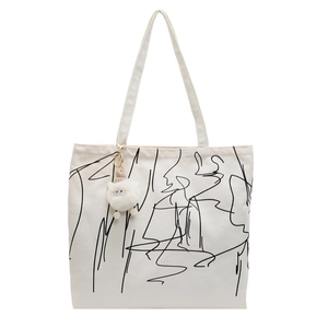 Borsa tote in tela bianca con graffiti astratti neri e ciondolo a forma di pecora