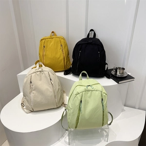 Minimalist nylon school backpack in various colors for students and travel use