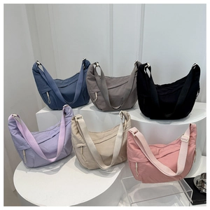 Minimalist large-capacity half-moon canvas crossbody bags in six assorted colors