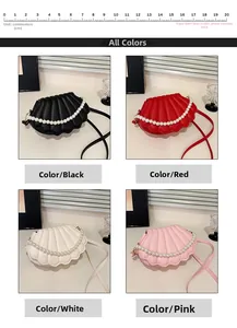 Compact shell crossbody bag with pearl strap in black red white and pink colors