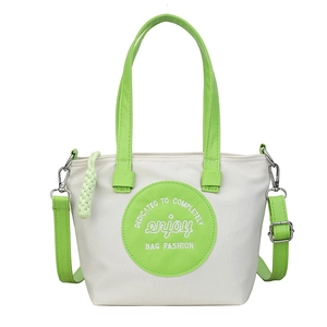 Sac seau minimaliste crème à grande capacité avec bretelles et poignée vert fluo contrastées