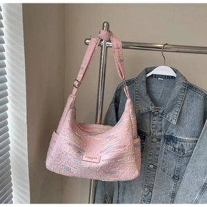 Detailed pink jacquard canvas crossbody bag with letter embroidery and side pockets